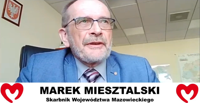 przemawia Marek Miesztalski, przewodniczacty rady nadzorczej lotniska w Modlinie